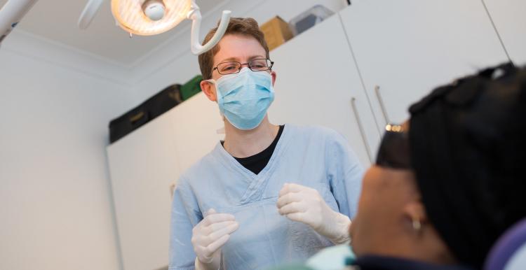 dentist examining patient