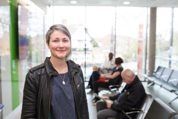woman stood up in waiting room