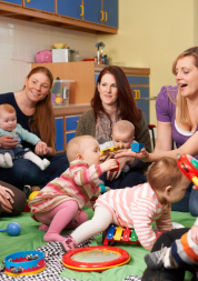 Mothers sat in a circle with their babies